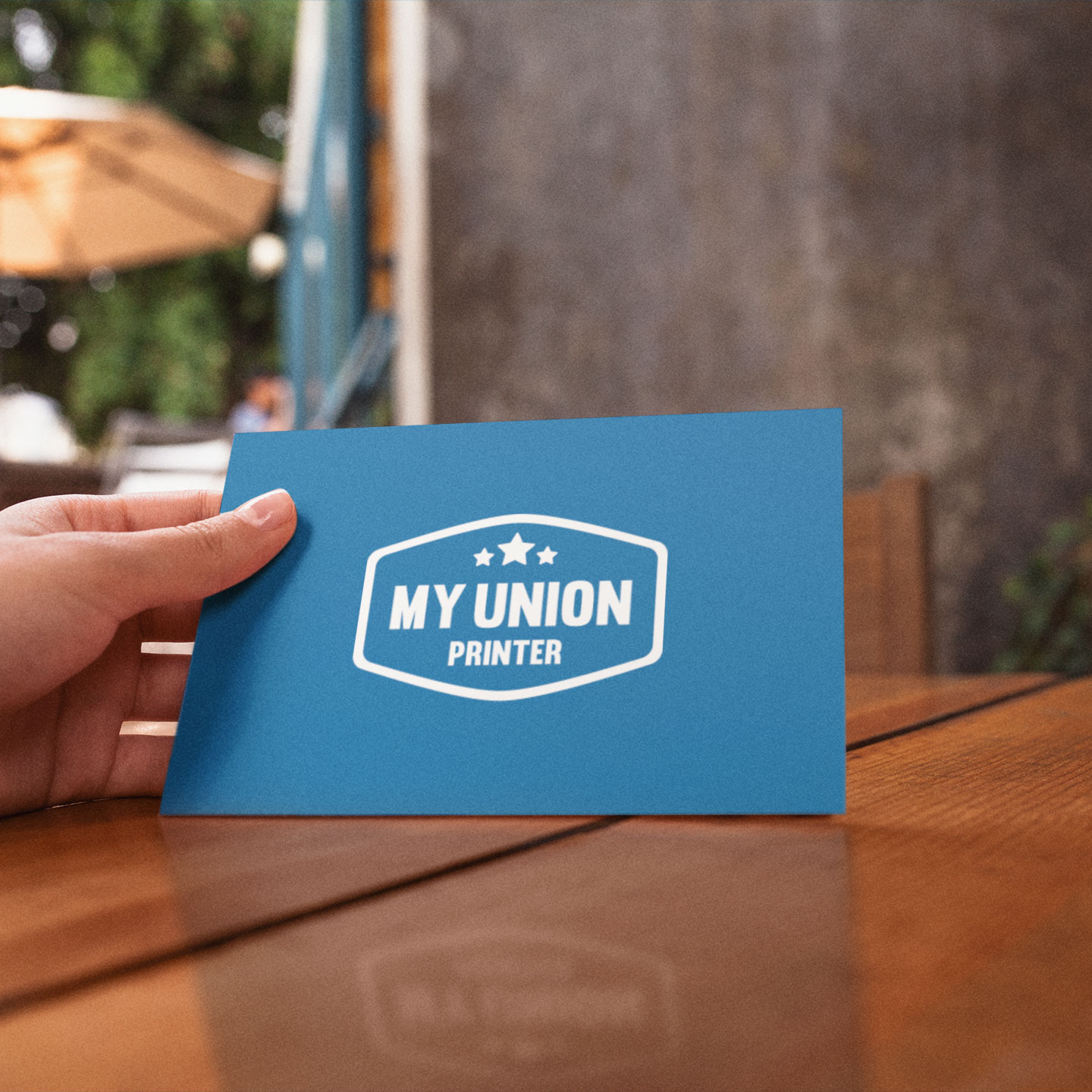 https://d2k0ypmb68i2k.cloudfront.net/smcrdonpr/images/product/postcard-template-being-read-on-a-wooden-table-at-a-cafe-a14737_03350030202405.jpg
